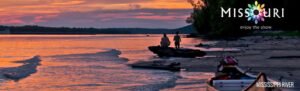 visitMo graphic of boaters on the shore of a river during a sunset